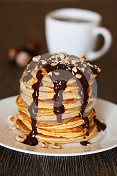 Pancakes with chocolate syrup